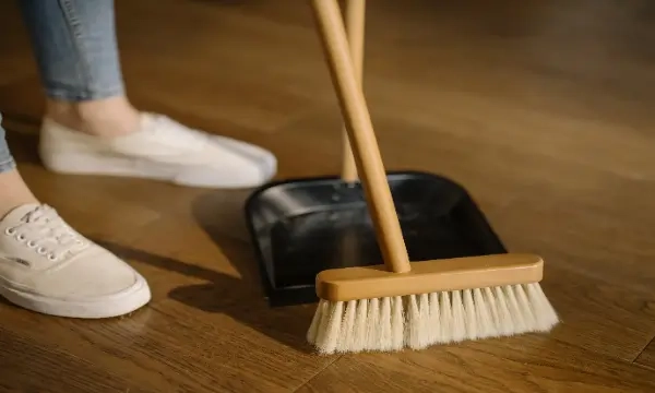 Image of a floor being swept